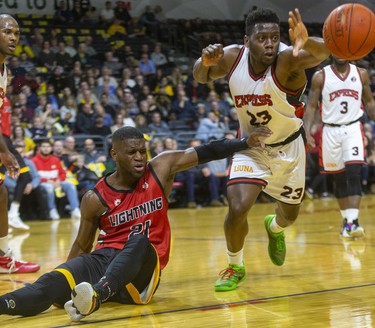 Abednego Lufile of the London Lightning loses the ball but draws the foul on Windsor's Kemy Osse in their NBL game Saturday night at Budweiser Gardens in London. 
Photograph taken on Saturday January 11, 2020. Mike Hensen/The London Free Press/Postmedia Network