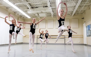 Young dancers from Grades 5, 6 and 7 practice their leaps  during auditions for Canada's National Ballet School at Dance Steps on Colborne Street in London on Sunday. The school teaches students in Toronto from Grades 6-12 with Grade 5 students able to attend summer school. Mike Hensen/The London Free Press/Postmedia Network