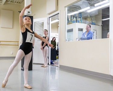 Shelby Smout, 9, poses as part of her audition for Canada's National Ballet School at Dance Steps on Colborne Street in London on Sunday. The school teaches students in Toronto from Grades 6-12 with Grade 5 students able to attend summer school. Mike Hensen/The London Free Press/Postmedia Network