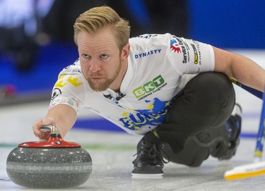 Sweden's Niklas Edin delivers a rock during his skins match Sunday afternoon against BJ Neufeld on the final day of the Continental Cup being played Sunday at the Western Fair Sports Centre in London, Ont. 
Photograph taken on Sunday January 12, 2020. 
Mike Hensen/The London Free Press/Postmedia Network