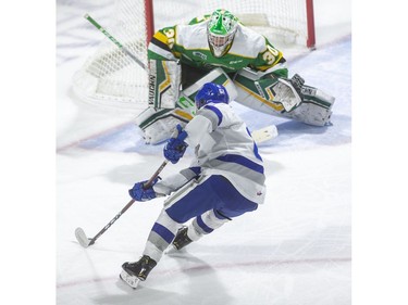 Chase Stillman of Sudbury moves in on his backhand on Knights goaltender Brett Brochu before trying to cross the crease and nearly getting a goal, but the ruling was the puck never crossed the line as the London Knights took on the Sudbury Wolves Friday at Budweiser Gardens. (Mike Hensen/The London Free Press)