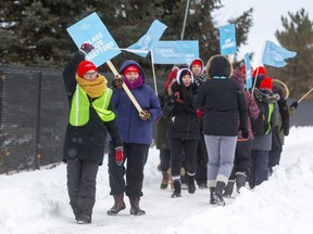 Ontario English Catholic Teachers' Association members were on strike for the first day in London on Jan. 21. (Mike Hensen/London Free Press)
