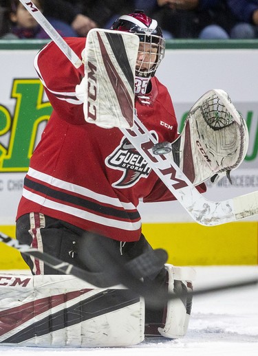 Nico Daws of the Guelph Storm makes a blocker save against the London Knights in the first period of their Sunday afternoon at Budweiser Gardens in London. Photograph taken on Sunday January 26, 2020. 
Mike Hensen/The London Free Press/Postmedia Network