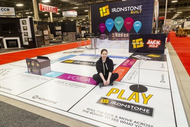 Leia Smoudianis of The Ironstone Building Company has their huge monopoly board ready for the Lifestyle Home show this weekend at the Western Fair's Agriplex in London, Ont.  Photograph taken on Thursday January 30, 2020.  Mike Hensen/The London Free Press/Postmedia Network