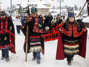 Wet'suwet'en Hereditary Chiefs from left, Rob Alfred, John Ridsdale, centre and Antoinette Austin, who oppose the Costal Gaslink pipeline take part in a rally in Smithers B.C., on Friday January 10, 2020. The Wet'suwet'en peoples are occupying their land and trying to prevent a pipeline from going through it. THE CANADIAN PRESS/Jason Franson