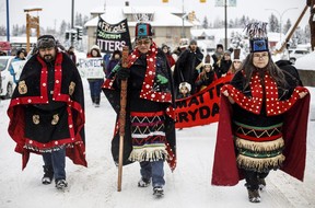 Wet'suwet'en Hereditary Chiefs from left, Rob Alfred, John Ridsdale, centre and Antoinette Austin, who oppose the Costal Gaslink pipeline take part in a rally in Smithers B.C., on Friday January 10, 2020. The Wet'suwet'en peoples are occupying their land and trying to prevent a pipeline from going through it. THE CANADIAN PRESS/Jason Franson