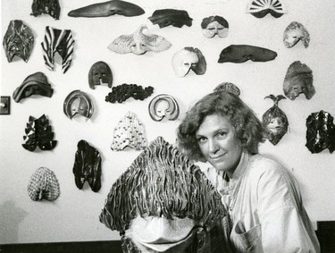 Marianne Fisher, London artisan, shows her raku masks, 1986. (London Free Press files)