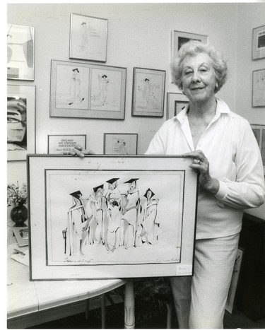 Muriel Burt, 72, displays her watercolors, she's an art therapist and lecturer, 1989. (London Free Press files)