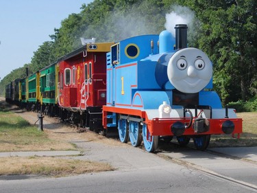 Thomas the Tank Engine steams along the tracks at the Elm Street crossing in St. Thomas on Friday July 22, 2011 on its way back to the St. Thomas-Elgin Memorial Arena to unload its passengers and re-load another group of anxiously awaiting riders during Day Out with Thomas. (Postmedia Network file photo)