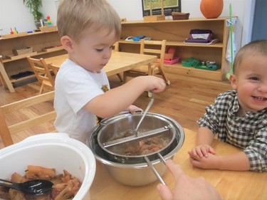 Montessori Academy of London’s toddler students love practical life skills, especially an activity that ends with a delicious product – applesauce!