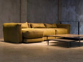 Burnished gold-tone fabric, wallpaper or metallic lighting teams well with the new on-trend warm stone colours. Lewis sofa in Gold, montauksofa.com.