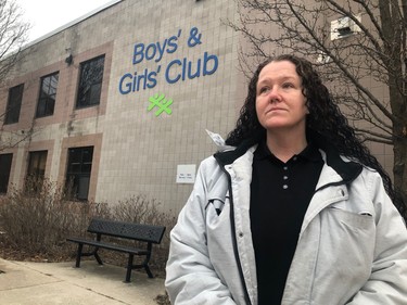 Judy Nelles stands outside the Boys and Girls Club of Londom after dropping her daughter off at the centre. Nelles, a single mom, says she supports teacher but is also worried about the possibility of an extended strike. (JONATHAN JUHA/The London Free Press)