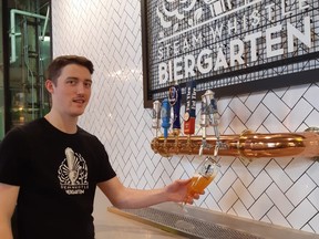 London native Cory Pitman pours a Steam Whistle Pilsner straight from a newly brewed tank at the Toronto brewery's biergarten eatery.
WAYNE NEWTON SPECIAL TO POSTMEDIA NEWS