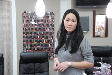 Thy Ha, owner of a nail salon at 920 Commissioners Rd. E., says she'll be forced to replace all of her equipment after a Sunday-morning explosion at a barbershop in the business plaza caused extensive water damage to her business. JONATHAN JUHA/The London Free Press