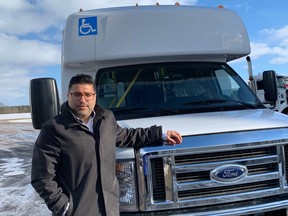 Shakil Popatiya, Hutton House's community services manager, says the theft of a catalytic converter from this bus hurts people with "high and complex needs" who depend on the vehicle for basic transportation. (Heather Rivers, The London Free Press)
