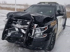 An OPP vehicle was stuck by a vehicle on Friday while an officer was checking on a driver in the ditch. The incident happened Friday morning near Tiverton, police said. Nobody was injured. (OPP supplied photo)