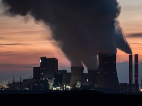 Steam rises from cooling towers at the Niederaussem coal-fired power plant on February 5, 2020 near Bergheim, Germany. According to the think tanks Agora Energiewende and Sandbag, CO2 emissions by power plants are down by 12% in comparison from 2018 to 2019 across the EU. Agora also reports that the percentage of electricity produced from renewable energy sources has risen to 35% across the EU. The Niederaussem power plant, operated by RWE, is Germany's second-largest power station and produces approximately 27 million tons of emissions annually. (Photo by Lukas Schulze/Getty Images)