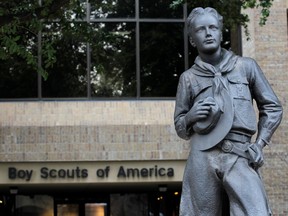 The statue of a scout stands in the entrance to the Boy Scouts of America headquarters in Irving, Texas.