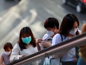 People wear masks in hopes of preventing the spread of the coronavirus in Bangkok, Thailand Jan. 28, 2020.