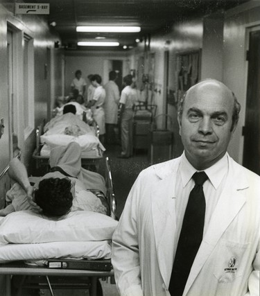 Dr. Craig MacDonald, chief of radiology, stands in a hallway congested with patients and staff at the radiology department on Victoria's South Street campus, 1985. (London Free Press files)