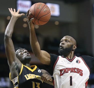 Otas Iyekekpolor, left, of the London Lightning pressures Quinnel Brown of the Windsor Express during their game on Wednesday, February 26, 2020 at the WFCU Centre in Windsor, ON. (DAN JANISSE/The Windsor Star)