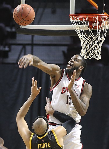 Sam Muldrow, above, of the Windsor Express blocks a shot by Cameron Forte  of the London Lightning during their game on Wednesday, February 26, 2020 at the WFCU Centre in Windsor, ON. (DAN JANISSE/The Windsor Star)