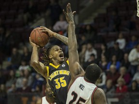 London's AJ Gaines takes a shot in the key against Windsor's Derrick Nix in National Basketball League of Canada action between the Windsor Express and the London Lightning at the WFCU Centre, Friday, February 21, 2020.  (DAX MELMER/Windsor Star)