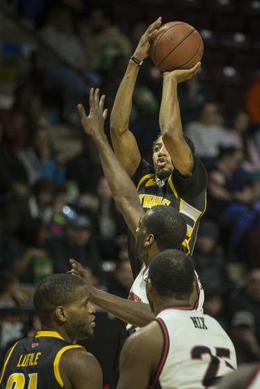 London's Marcus Capers takes an outside shot in National Basketball League of Canada action between the Windsor Express and the London Lightning at the WFCU Centre, Friday, February 21, 2020.  (DAX MELMER/Windsor Star)