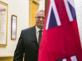Ontario Premier Doug Ford walks out of his office to address media at Queen's Park in Toronto, Ont. on Thursday January 16, 2020.