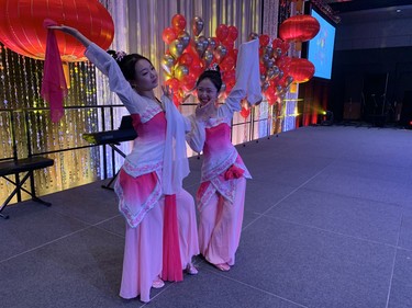 Dancers Jing Chen, left, and Yue Ma get ready to perform at the 2020 Dragon Gala at RBC Place Saturday Feb. 8. The annual celebration is organized by the London chapter of the Chinese Canadian National Council. (Jennifer Bieman/The London Free Press)