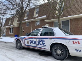 London police remained at a townhouse complex at 92 Stroud Cres. Saturday morning after an overnight operation led to the arrest of one man, police said. DALE CARRUTHERS / THE LONDON FREE PRESS