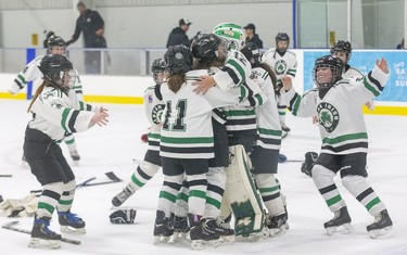 The Lucan Irish celebrate their 3-0 win over Detroit Honeybaked in the Atom B championship game at the 30th Annual London Devilettes Tournament in London on Sunday. (Derek Ruttan/The London Free Press)