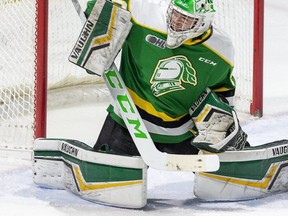 London Knights goalie Brett Brochu makes a stick save during a game against the Saginaw Spirit in London. Derek Ruttan/The London Free Press/Postmedia Network