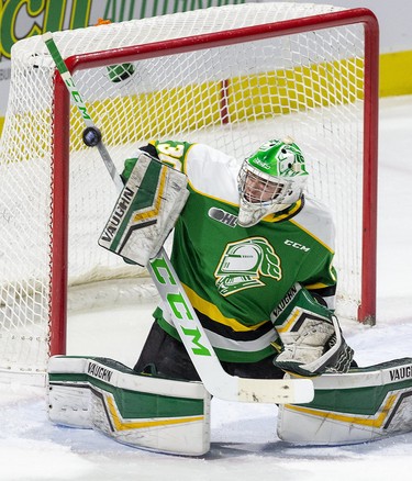 London Knights goalie Brett Brochu makes a stick save during a game against the Saginaw Spirit in London. Derek Ruttan/The London Free Press/Postmedia Network