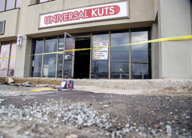 An explosion and fire at Universal Kuts barbershop caused $750,000 in a strip mall at the corner of Commissoners Road and Adelaide Street in London, Ont. on Sunday Feb. 16, 2020. Derek Ruttan/The London Free