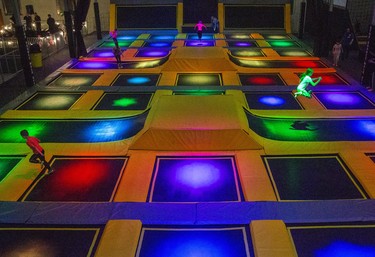 Children enjoy an afternoon of trampolining at The Factory in London, Ont. on Monday February 17, 2020. The trampolines feature different coloured lights underneath the canvas. Derek Ruttan/The London Free Press/Postmedia Network