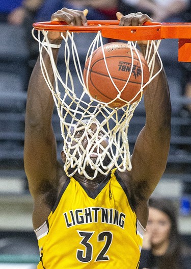 Randy Phillips slams home two points for the London Lightning in the second quarter of their game against the Kitchener-Waterloo Titans in London, Ont. on Monday February 17, 2020. Derek Ruttan/The London Free Press/Postmedia Network