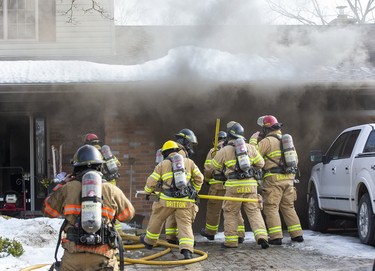 One resident was taken to hospital as a precaution after escaping a house fire at 190 Wychwood Park in London, Ont. on Monday February 24, 2020. Twenty firefighters teamed up to put out the fire. A preliminary damage estimate was set at $300,00 to $400,000.Derek Ruttan/The London Free Press/Postmedia Network