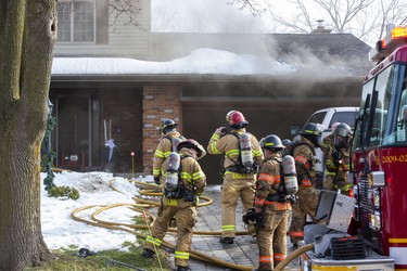 One resident was taken to hospital as a precaution after escaping a house fire at 190 Wychwood Park in London, Ont. on Monday February 24, 2020. Twenty firefighters teamed up to put out the fire. A preliminary damage estimate was set at $300,00 to $400,000.Derek Ruttan/The London Free Press/Postmedia Network