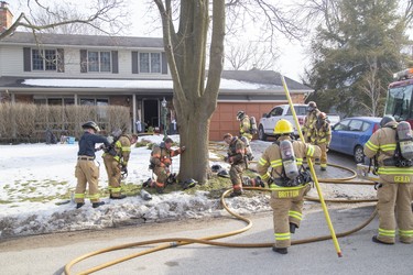 One resident was taken to hospital as a precaution after escaping a house fire at 190 Wychwood Park in London, Ont. on Monday February 24, 2020. Twenty firefighters teamed up to put out the fire. A preliminary damage estimate was set at $300,00 to $400,000.Derek Ruttan/The London Free Press/Postmedia Network