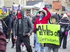 Protestors march north on Richmond street toward the CP Rail tracks in London on Friday Feb. 28, 2020 in support of the Wet'suwet'en hereditary chiefs. Derek Ruttan/The London Free Press