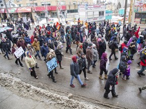 Protestors march north on Richmond street across the CP Rail tracks toward Picadilly Street  in London on Friday Feb. 28, 2020 in support of the Wet'suwet'en hereditary chiefs. Derek Ruttan/The London Free Press