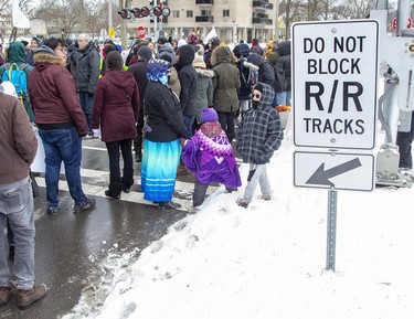 Approximately 300 people occupied the CP Rail tracks at Waterloo Street and Pall Mall Street in support of Wet'suwet'en hereditary chiefs. Photo shot in London, Ont. on Friday February 28, 2020.  Derek Ruttan/The London Free Press/Postmedia Network