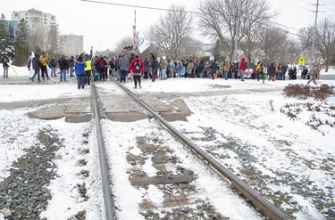 Approximately 300 people occupied the CP Rail tracks at Waterloo Street and Pall Mall Street in support of Wet'suwet'en hereditary chiefs. Photo shot in London, Ont. on Friday February 28, 2020.  Derek Ruttan/The London Free Press/Postmedia Network