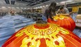 Co-chairs Vivian Iron and Alan Chan, of the Chinese Canadian National Council's London Chapter Dragon Festival assemble huge Chinese lanterns before they are lifted to the ceiling at the RBC Place London.  570 guests are expected Saturday night for the celebration of the Chinese New Year, with a charity component going towards El Sistema Aeolian. (Mike Hensen/The London Free Press)