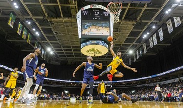 AJ Gaines of the London Lightning tries for a shot after colliding with Carl Hall the the Halifax Hurricanes during their Sunday afternoon game at Budweiser Gardens in London. 
Photograph taken on Sunday February 9, 2020. 
Mike Hensen/The London Free Press/Postmedia Network
