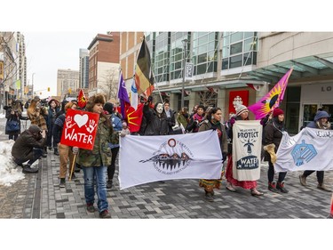 A large group of protesters heads west on  Dundas Street from Wellington Street Tuesday Feb. 11, 2020, on their way to Richmond Street, then Queens Avenue to RCMP offices on Talbot Street.  London protesters were showing solidarity with the Wet'suwet'en Nation which is blockading the Coastal GasLink pipeline in B.C. Mike Hensen/The London Free Press