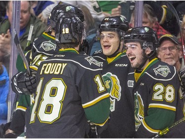 The Knights top power play clicked quickly as Jonathan Gruden celebrates his first minute goal with Alec Regula, Liam Foudy, Ryan Merkley and hidden Connor McMichael in the first minute of their game against the Guelph Storm at Budweiser Gardens in London, Ont.  Photograph taken on Tuesday February 11, 2020.  Mike Hensen/The London Free Press/Postmedia Network