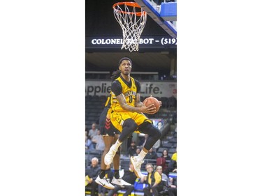 Mo Bolden of the Lightning goes up for a big reverse layup against Jarius Holder of the Sudbury Five during their NBL game at Budweiser Gardens in London, on Thursday Feb. 13, 2020.  Mike Hensen/The London Free Press