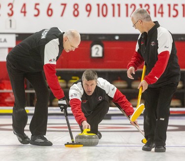 Howard Rajala delivers a rock in the second end of their senior men's provincial championship match Sunday at the St. Thomas Curling Club. Rajala faced the Armstrong rink out of Ingersoll, skipped by Bob Armstrong. Rajala scored three in the first end and then held on for a 7-5 win over the local rink. Mike Hensen/The London Free Press/Postmedia Network